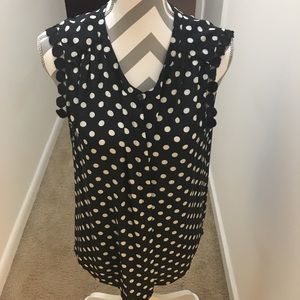 Cute polka dot blouse with embellishments on arms